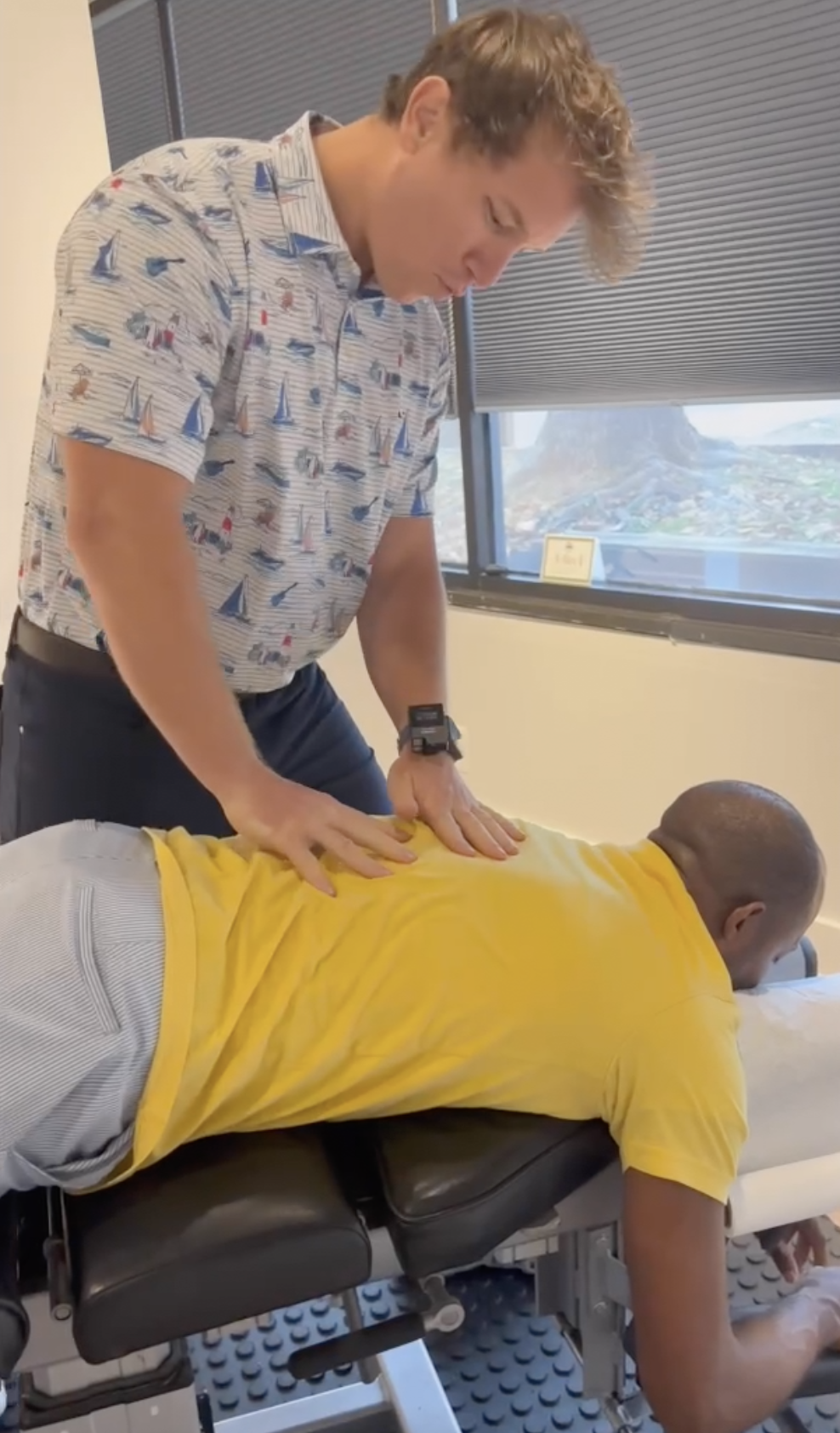 Dr. Farmer performing a corrective chiropractic adjustment at The Spine Works
